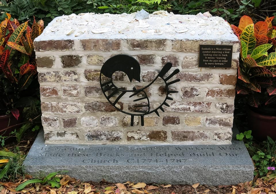 The Slave Memorial at the Unitarian Church is a short column of brick decorated with a metal bird.