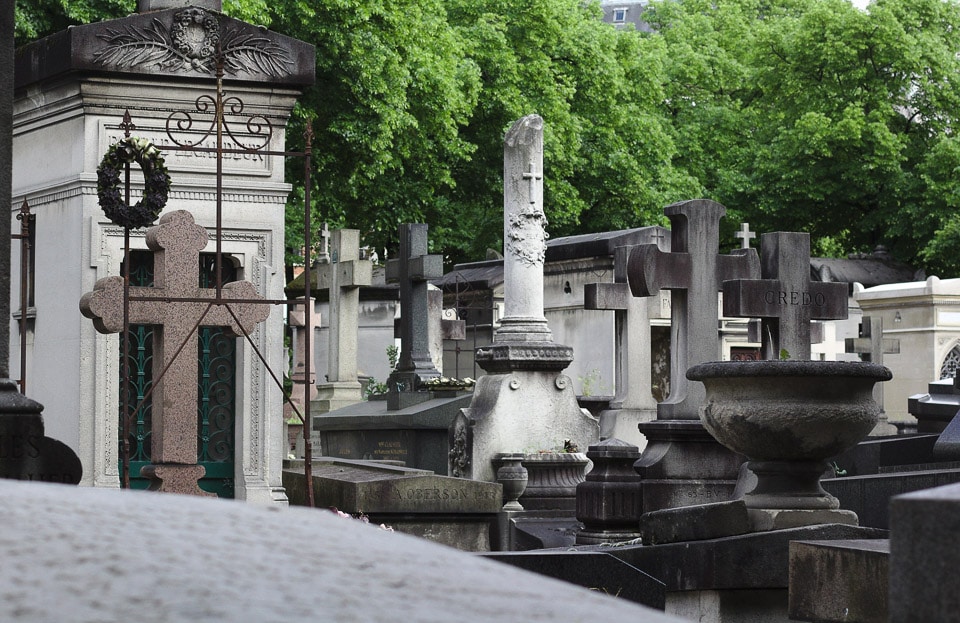 Crosses and tombstones in Montparnasse Cemetery.