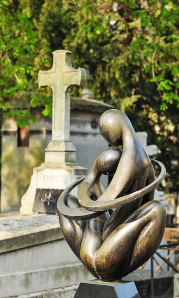 Sculpted funerary art in Montmartre Cemetery.