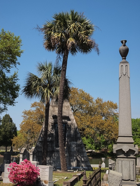 Memorials and palm trees in Magnolia Cemetery.
