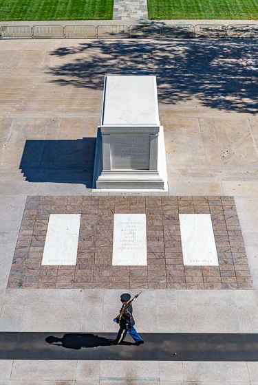 Aerial view of a soldier walking the mat in front of the Tomb of the Unknown Soldier.