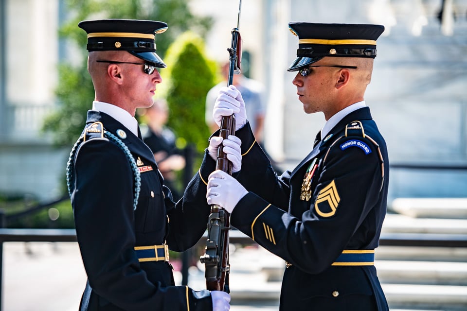 Inspecting the rifle during the Changing of the Guard at Arlington National Cemetery.
