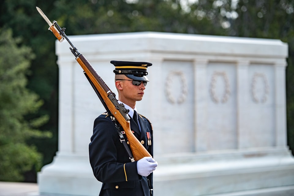 Tomb guard with rifle at the Tomb of the Unknown Soldier.