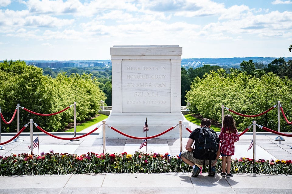 Visitors laying flowers at the Tomb of the Unknown Soldier.