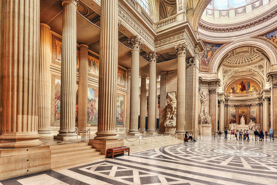 Columns, paintings and sculptures inside the Paris Pantheon.