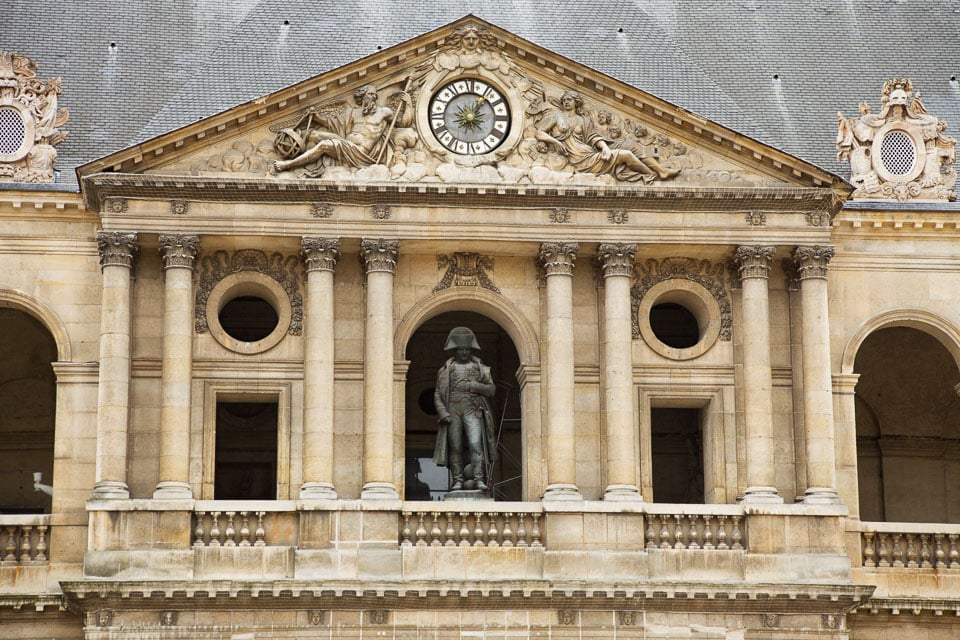 Statue of Napoleon Bonaparte on a balcony at Les Invalides.