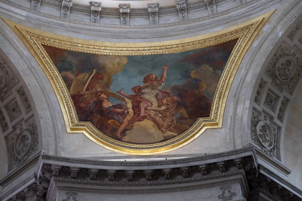 Gold-framed painting under the dome in Les Invalides.