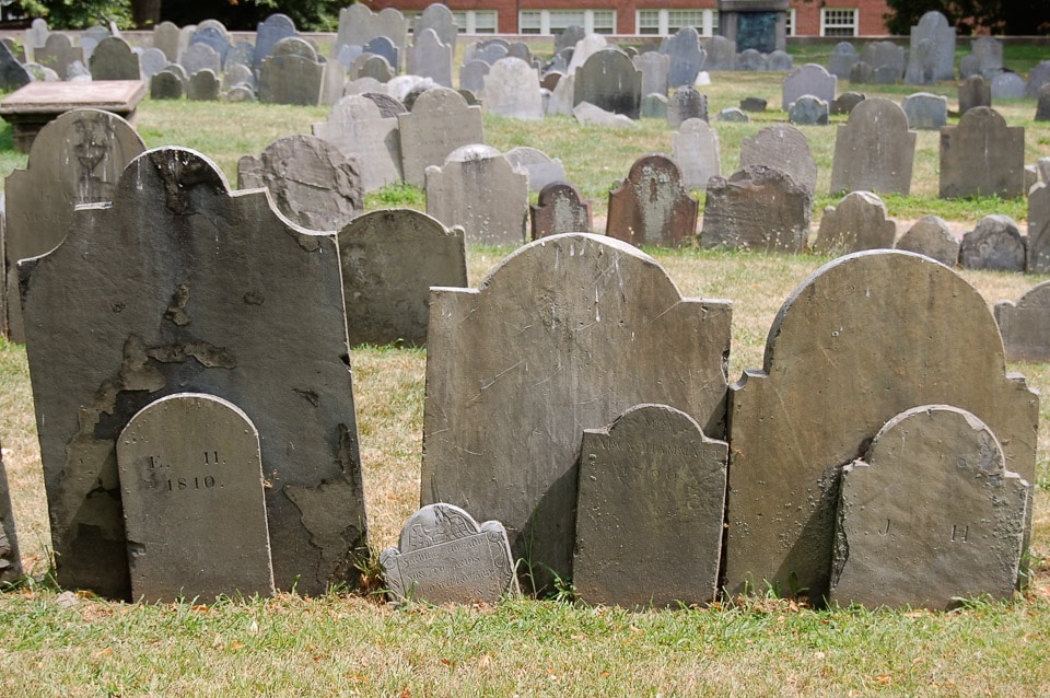 Rows of worn tombstones.