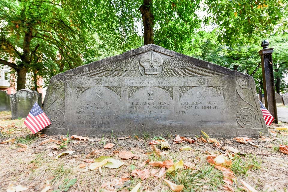 Wide gravestone for the three Neal children.