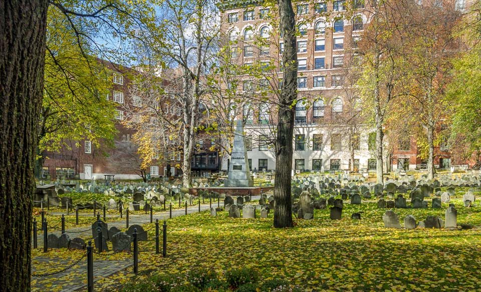 Fallen leaves among the graves in Granary Burying Ground, Boston.