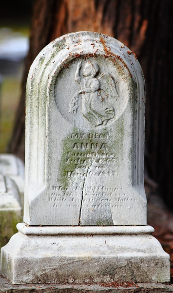 Angel on an old tombstone.