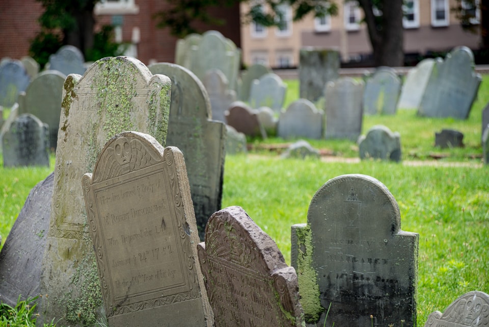 A group of old gravestones.