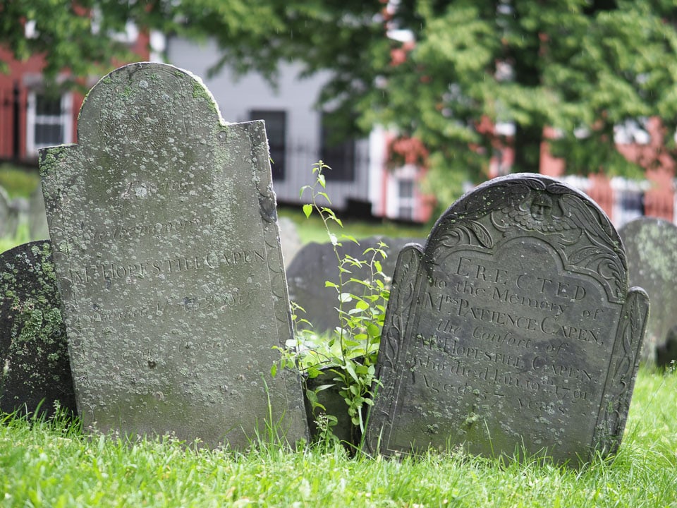 Two leaning tombstones.