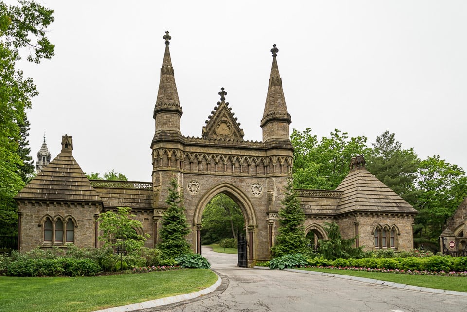 Elaborate stone gate at the entrance to Forest Hills Cemetery.