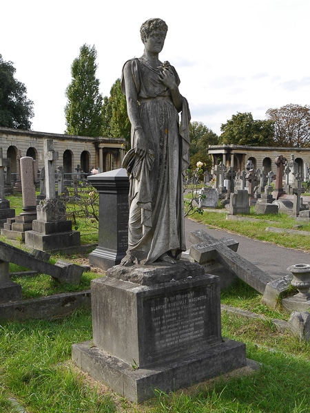 Sculpture and tombstones in Brompton Cemetery.