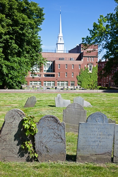 Copp's Hill Burying Ground with a building in the background.