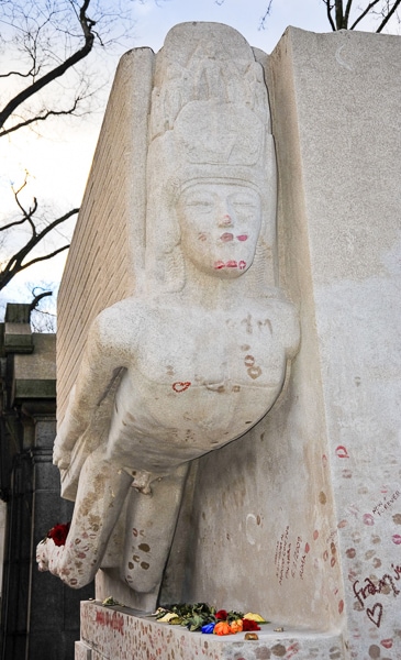 Lipstick kisses on the tomb of Oscar Wilde.