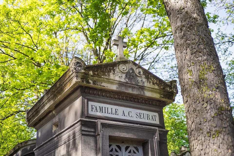 Cross on top of the family tomb of Georges Seurat.