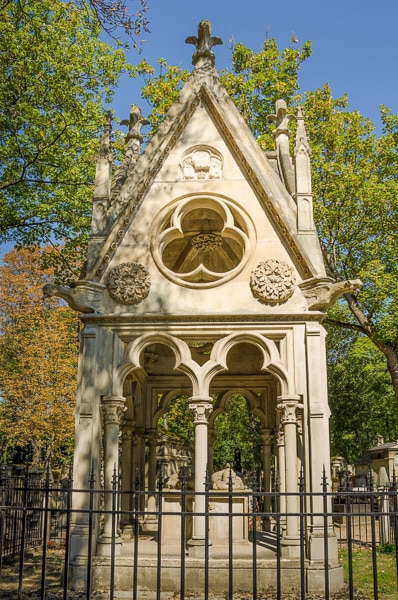 Gothic canopy above the tomb of Heloise and Abelard in Pere Lachaise Cemetery.