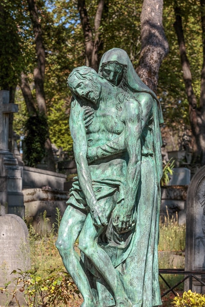 Sculpture on the grave of Cino del Duca in Pere Lachaise Cemetery.