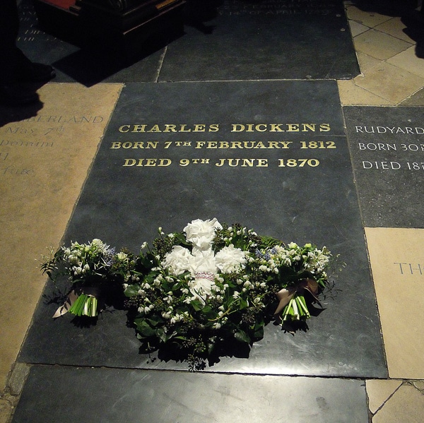 Grave of Charles Dickens, one of many famous people buried in Westminster Abbey.