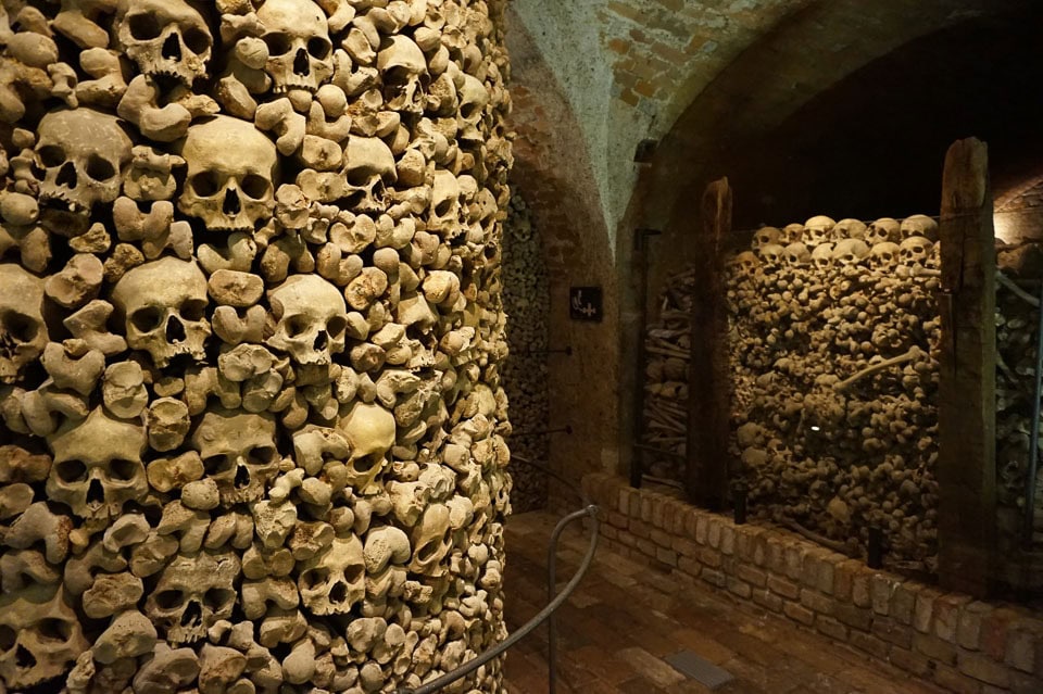 Column of bones in the Brno Ossuary.