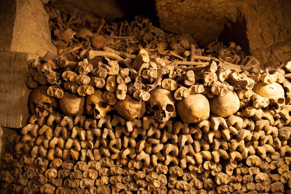 Pile of bones and skulls in an underground ossuary.