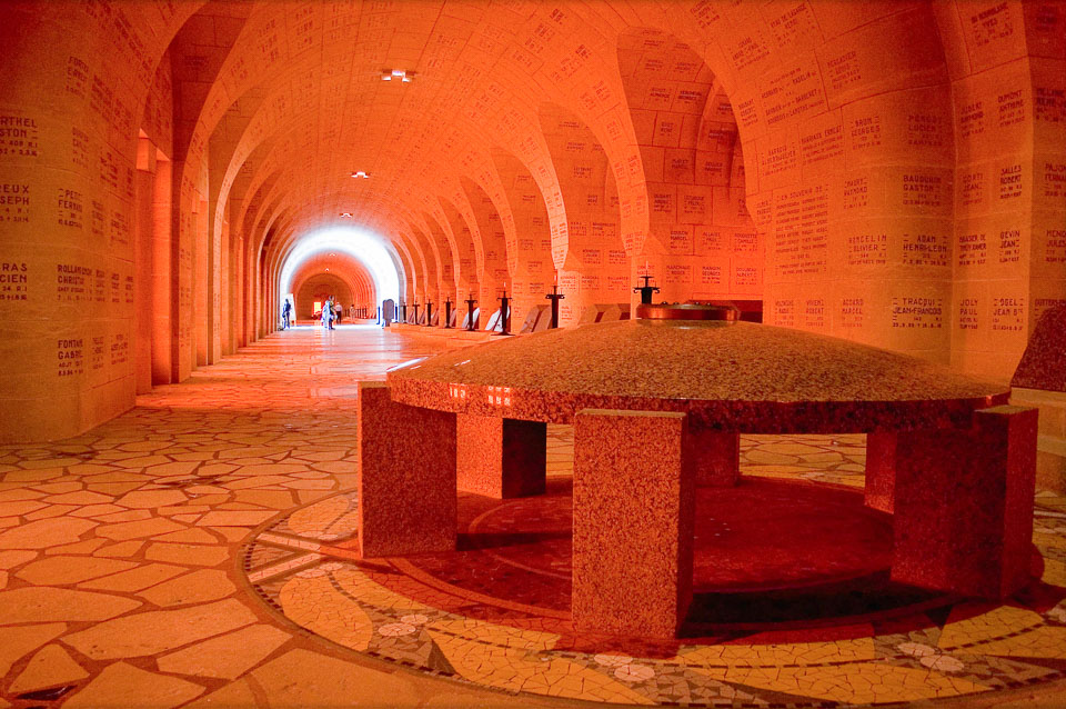 Unlit memorial flame inside the ossuary.