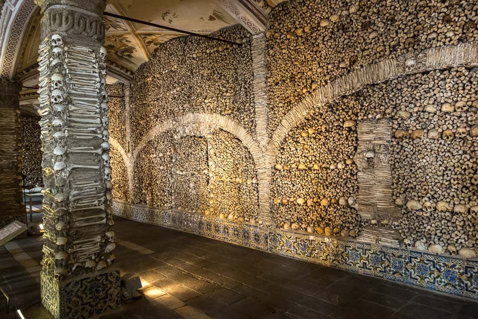 Bone covered wall and pillar inside the Chapel of Bones.