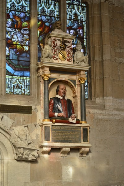 Shakespeare's funerary monument hanging on a wall.