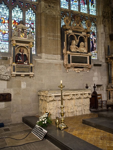 Shakespeare's funerary monument on a wall beside his grave.